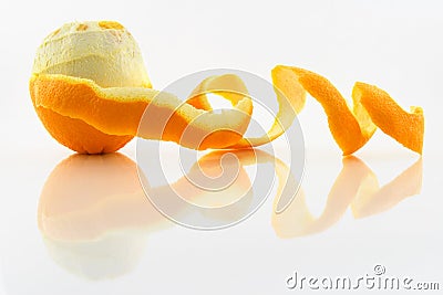 Orange with peeled skin Stock Photo