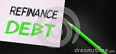 Orange pencil writes the words Refinance Debt. Business concept Stock Photo