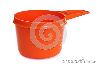 Orange Plastic Measuring Cup Stock Photo