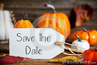 Orange Pumpkin Decoration With Label With Text Save The Date Stock Photo