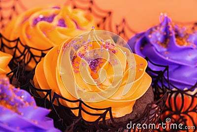 Orange and purple Halloween cupcakes Stock Photo