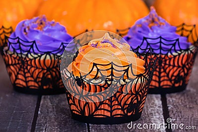 Orange and purple Halloween cupcakes Stock Photo