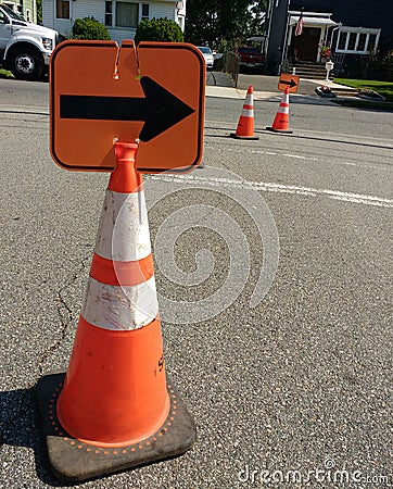 Orange Reflective Traffic Safety Cones with Arrows Editorial Stock Photo