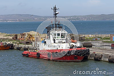 Orange rescue or coast guard patrol boat in blue sea water Stock Photo