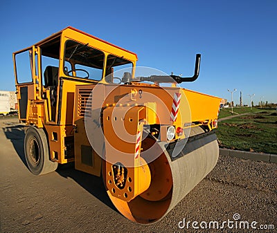 Orange road-roller Stock Photo