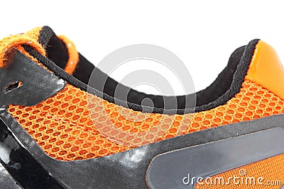 Orange running shoe side Stock Photo