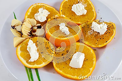 Orange salad and flat cheese from North Africa Stock Photo