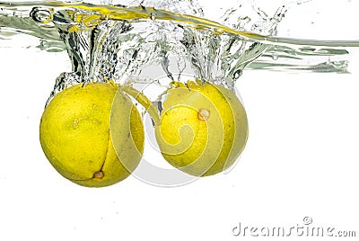 Orange sanguinello falling in water and splash on white background Stock Photo