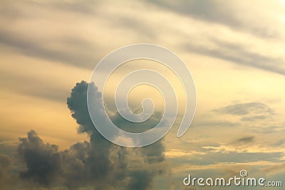 Orange sky in the evening with a cloud of dogs Stock Photo