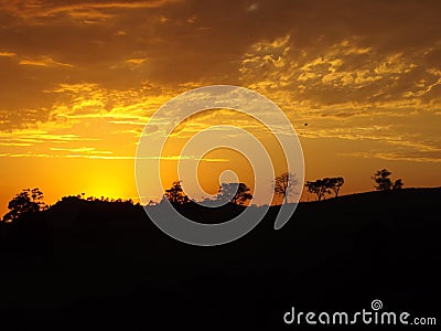 Orange sky line on sunrise countryside Stock Photo