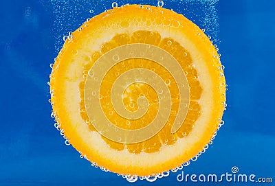 Orange Slice With Bubbles Stock Photo