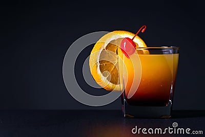 Orange slice and glass of juice Stock Photo