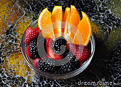 Orange slices, strawberries, and blackberries Stock Photo