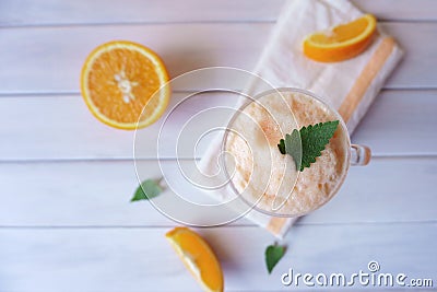 Orange smoothie, milkshake with orange and mint Stock Photo