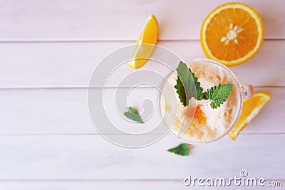 Orange smoothie, milkshake with orange and mint Stock Photo