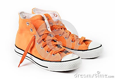 Orange sneakers isolated Stock Photo