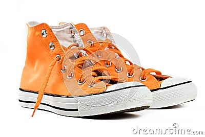 Orange sneakers isolated Stock Photo