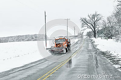 Snow Plow Clearing Roads in Wisconsin Editorial Stock Photo