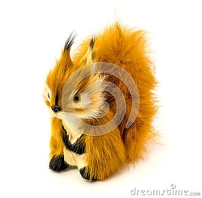 Orange statuette of a squirrel isolated on a white background Stock Photo