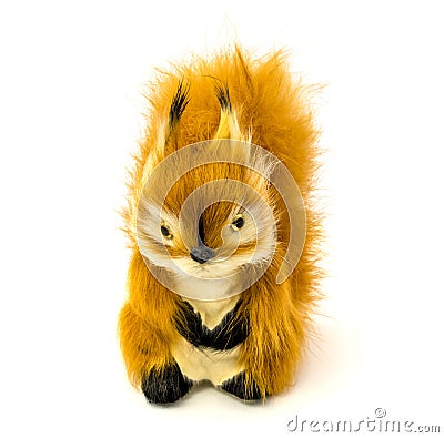 Orange statuette of a squirrel isolated on a white background Stock Photo