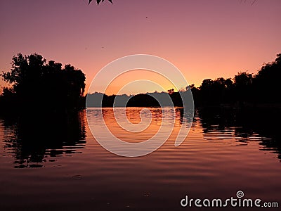 Orange sunset on the lake Stock Photo