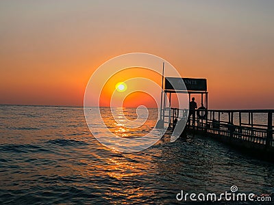 Orange sunset over Lake Tanganyika Stock Photo