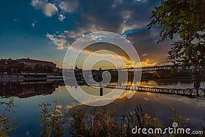 Sunset in Roudnice nad Labem town with old church and towers with Labe river Editorial Stock Photo