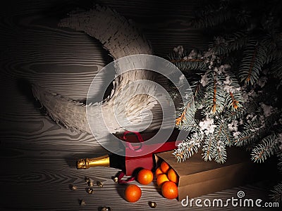 Orange tangerines near winter trees. Christmas mood Stock Photo