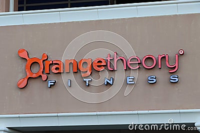 Orange Theory Fitness sign on building. Editorial Stock Photo