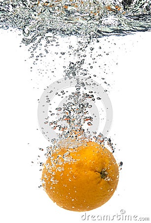 Orange thrown into water Stock Photo