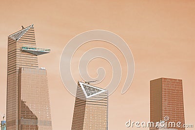 Orange toned skyscrapers glass and concrete Stock Photo