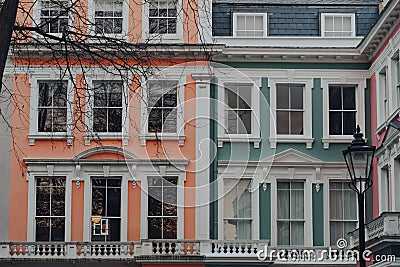 Orange, turquoise and pink pastel houses in Primrose Hill, London, UK Stock Photo