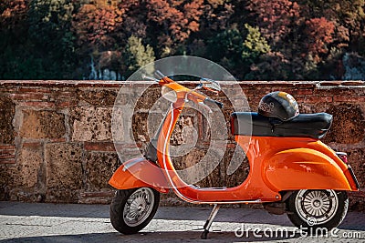 Orange Vespa byke Stock Photo