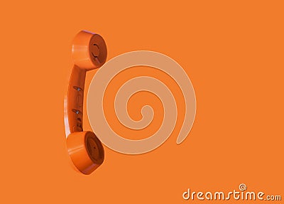 Orange vintage telephone handset, retro style Stock Photo