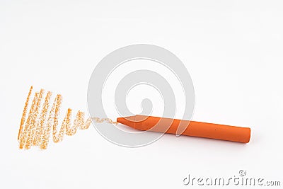 An orange wax crayon Stock Photo