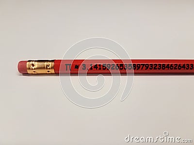 Orange wood pencil with mathematical constant pi on white surface Stock Photo
