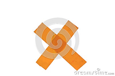 Orange wrong sign, do not paste on the wall, made of scotch tape isolated on white background.Clipping path Stock Photo