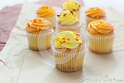 Orange and yellow halloween cupcakes Stock Photo