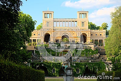 Orangery Palace in Potsdam Germany with the beautiful garden on a sunny day Stock Photo