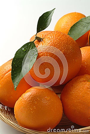 Oranges in a basket Stock Photo