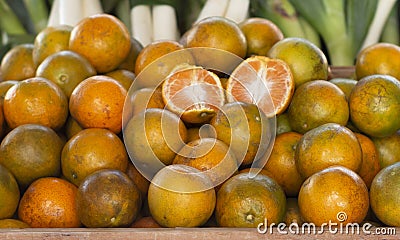 oranges in basket in market Stock Photo