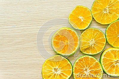 Oranges cut in half on a wooden background, free space Stock Photo