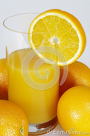 Oranges and glass of orange juice Stock Photo