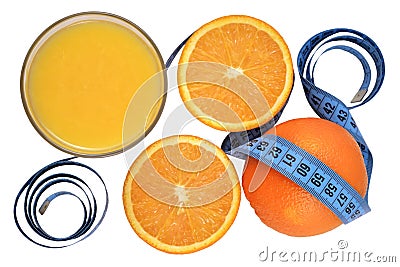 Oranges, glass of orange juice and measuring tape Stock Photo