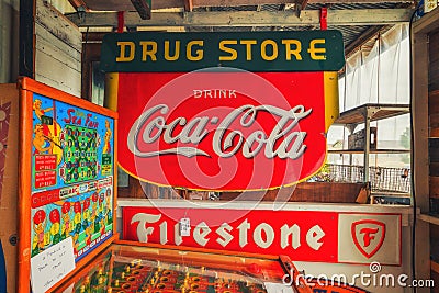 Vintage Coca-Cola sign from an old Drug Store in small antique shop in Orcutt, Santa Barbara County, CA Editorial Stock Photo