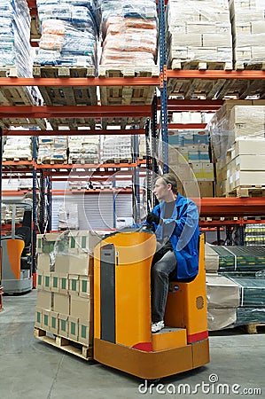 Order picker loader in warehouse Stock Photo
