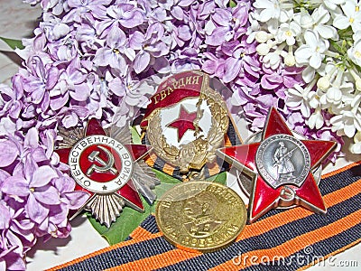 Orders of the `Red Star`, `Great patriotic war`, sign of `Guards`, medal `of Victory in the great Patriotic war 1941-1945` Editorial Stock Photo