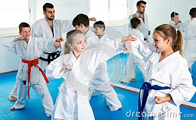 Ordinary children sparring in pairs Stock Photo