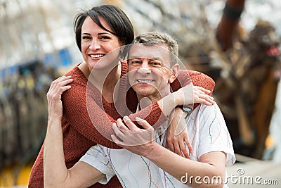 Ordinary couple in love posing outdoors Stock Photo