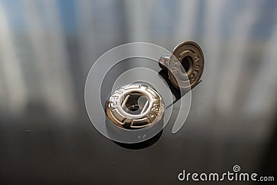 Ordinary Metal Rivet Button. Stock Photo